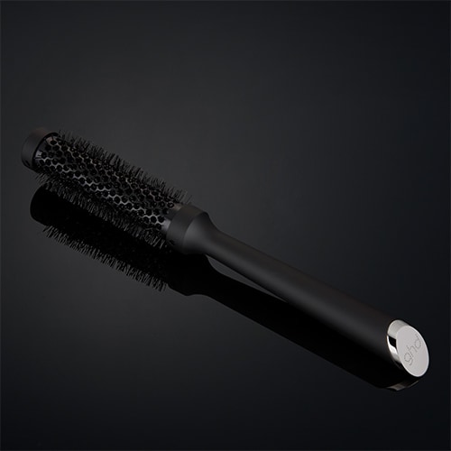 ghd ceramic vented radial brush Größe 1 auf dunklem Hintergrund