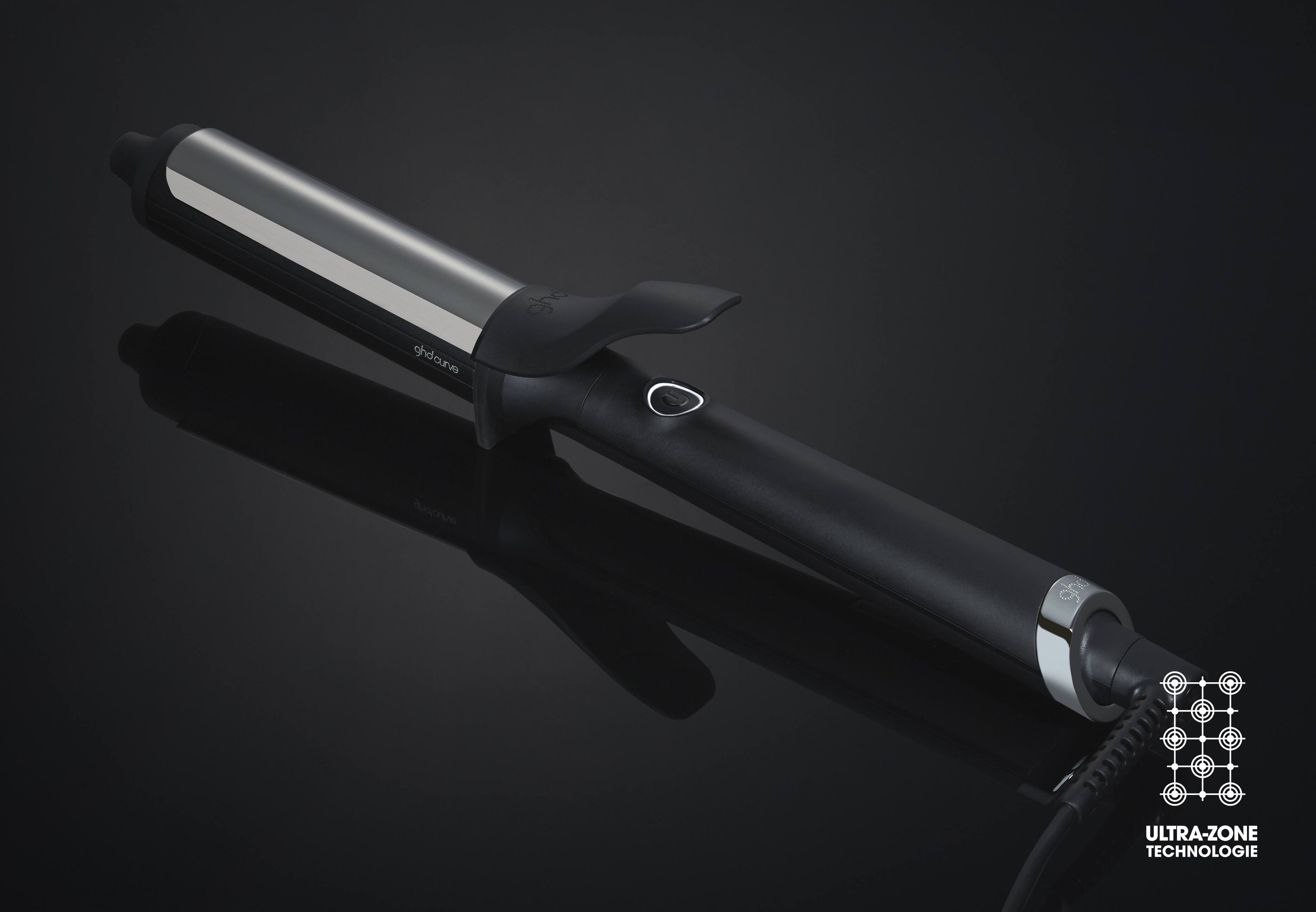 ghd curve® soft curl tong auf dunklem Hintergrund