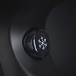 Helios hair dryer in black with close up of cool shot button Helios hair dryer in black with close up of cool shot button