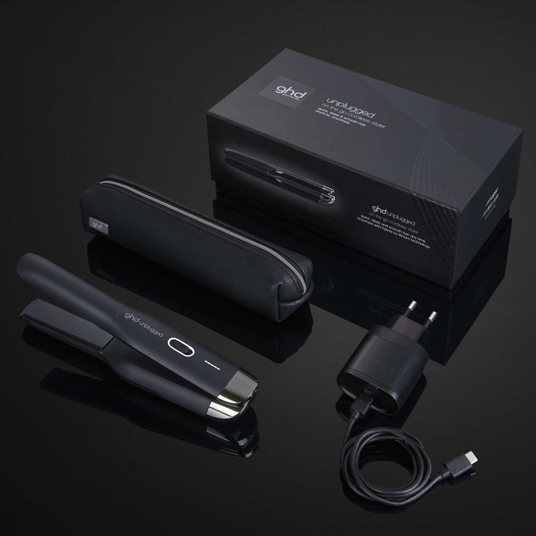 ghd unplugged negra con neceser y cargador