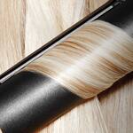 plancha de pelo de viaje de ghd sobre pelo rubio plancha de pelo de viaje de ghd sobre pelo rubio